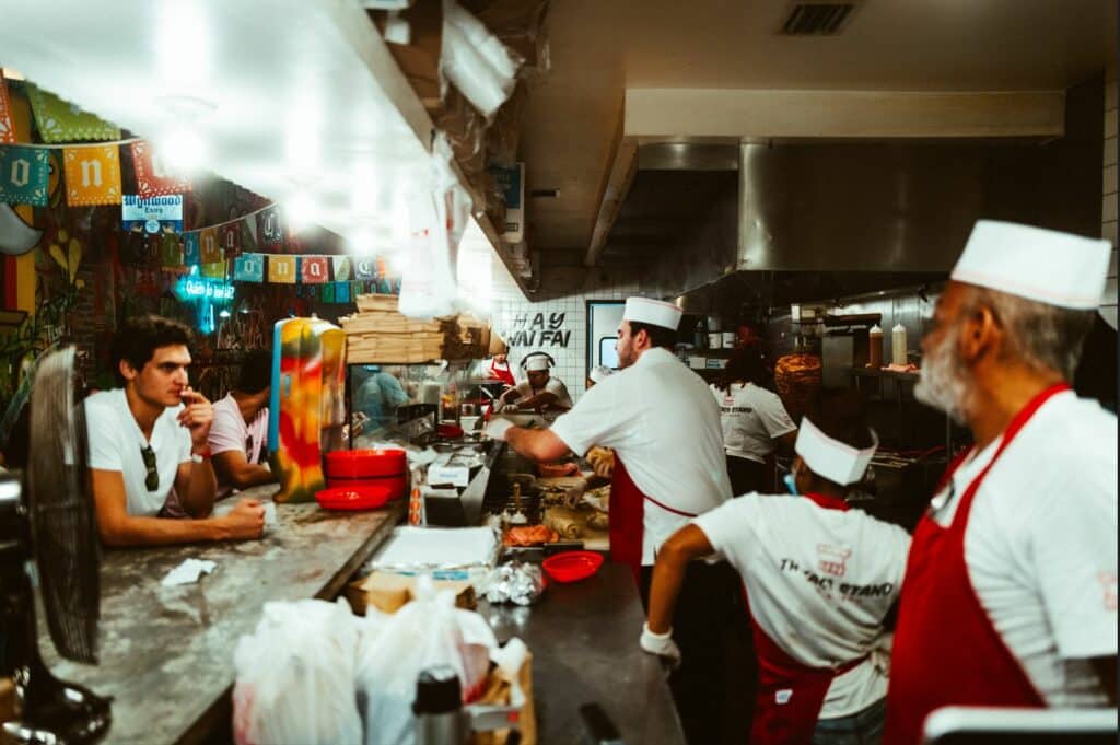 The busy kitchen of a Mexican food establishment in Miami's culinary scene