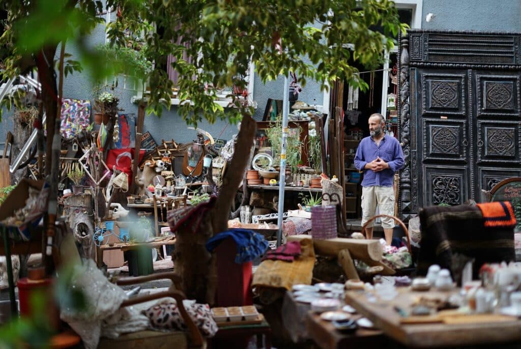 A vendor looking over his open-air display of antiques and oddities in Çukurcuma