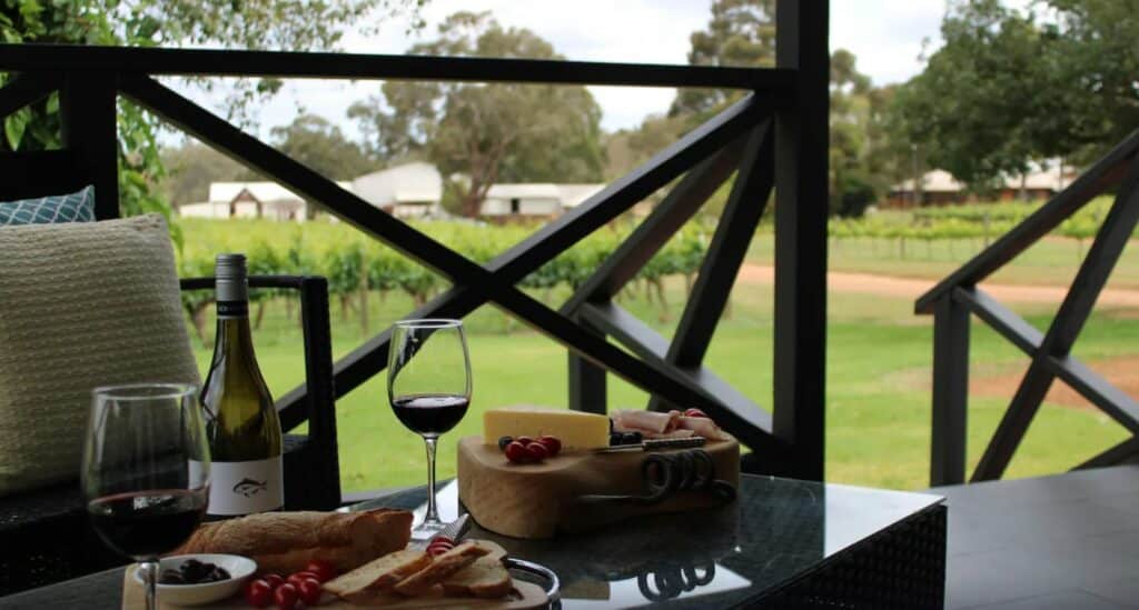 Apart from cheese, bread, fresh fruits, and meat, wine is best paired with a view, such as the one seen in this Cottage in Bakersville, Perth.