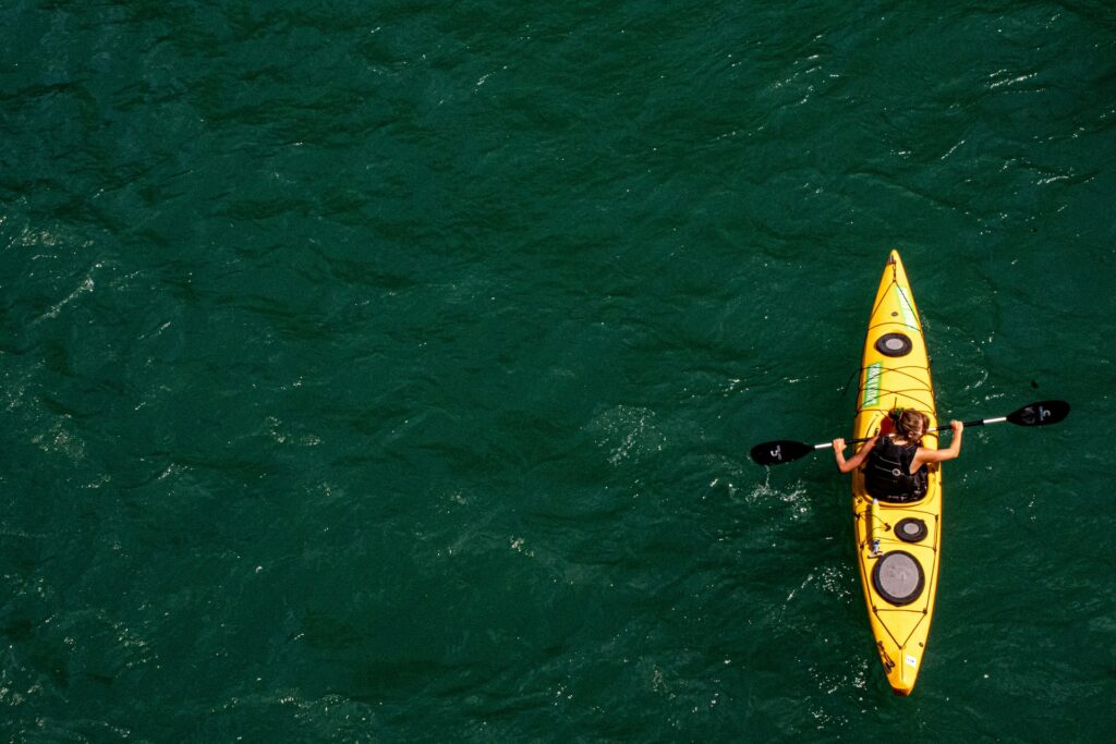 A drone shot of a woman's kayaking adventures in Sarasota